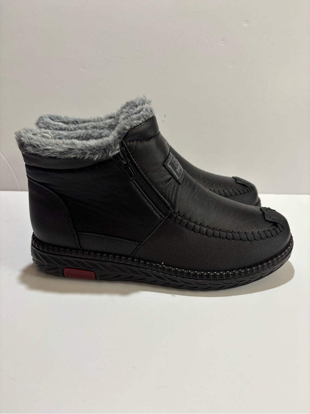 Women’s Black Faux-Fur Lined Zip Ankle boots